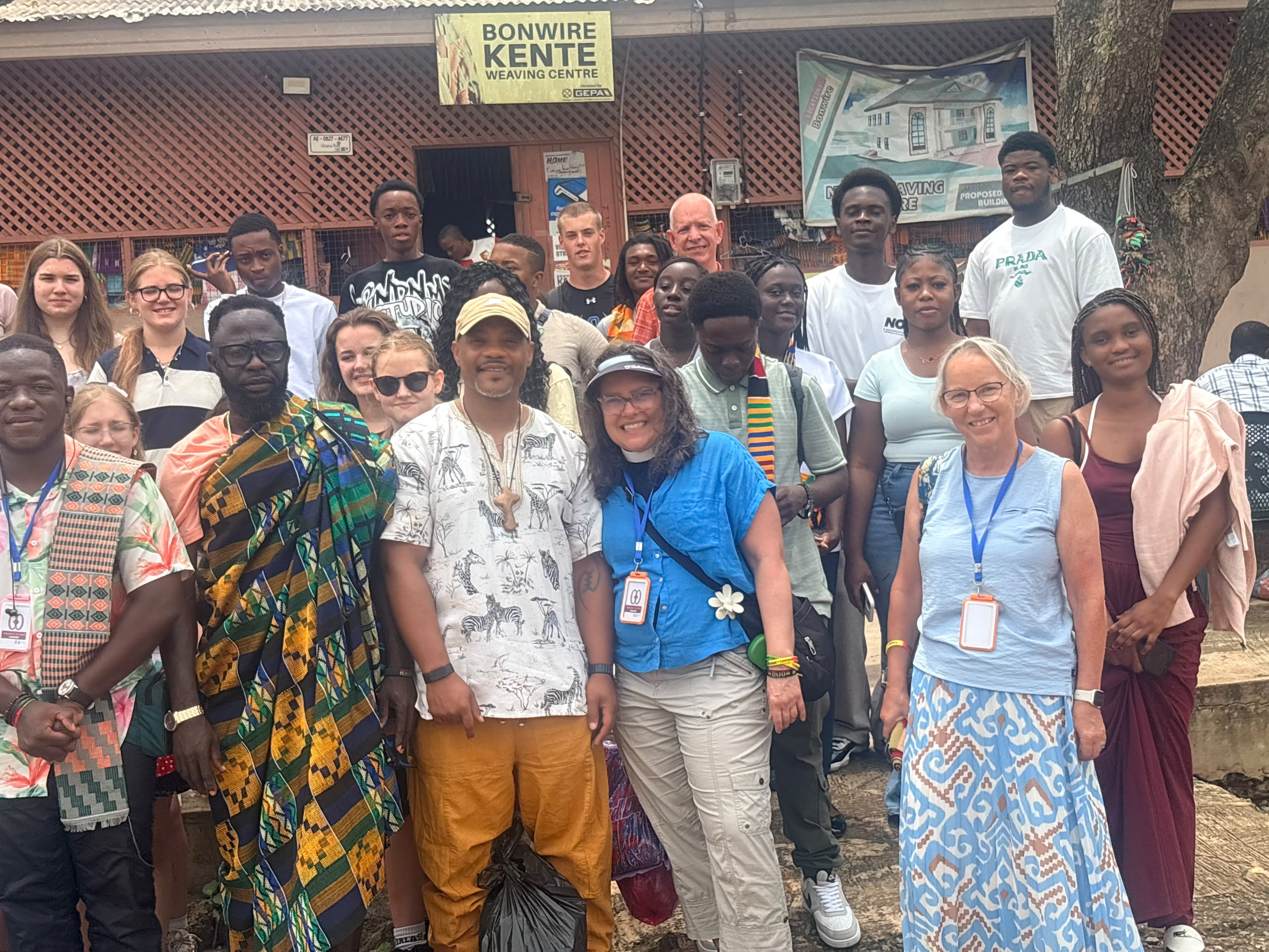 Triangle of Hope pilgrims gather near the Bonwire Kente Weaving Center in Ghana