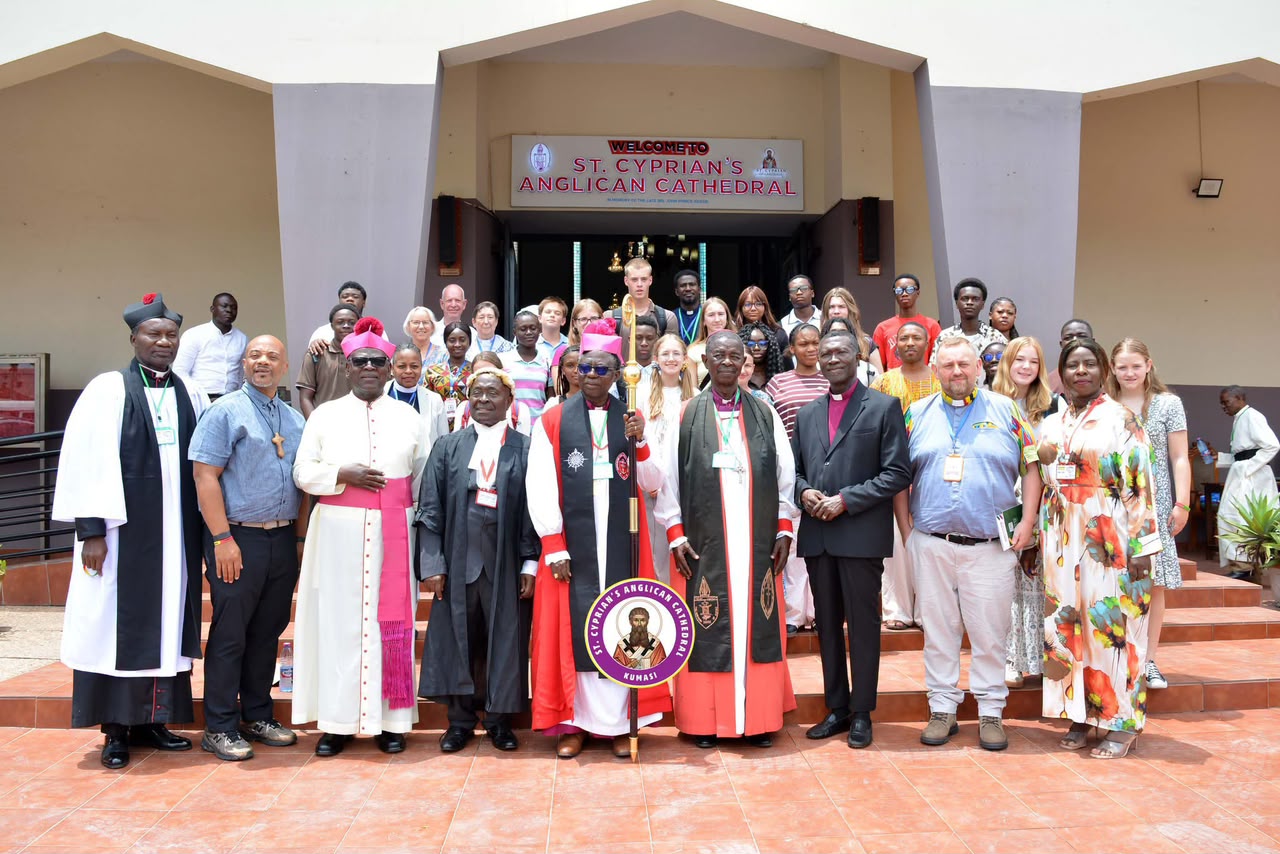 Anglican clergy and Triangle of Hope participants gather outside St. Cyprian Cathedral in Kumasi