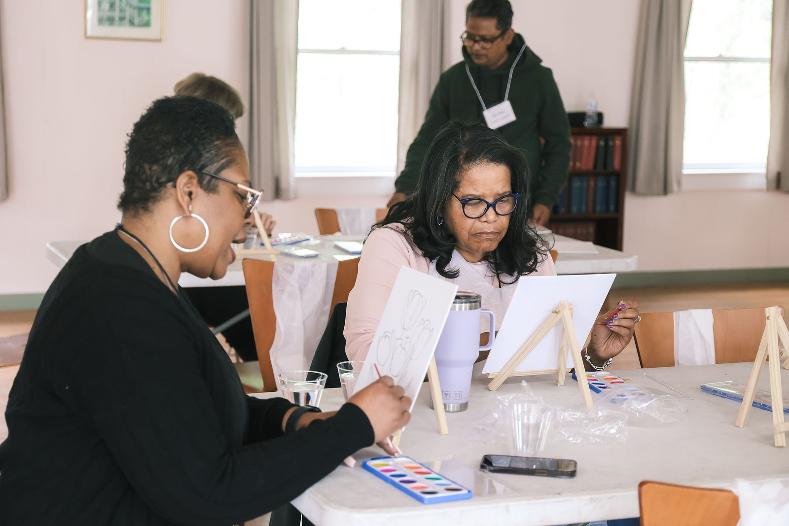 Clergy participating in a creative activity during the Spring Clergy Retreat