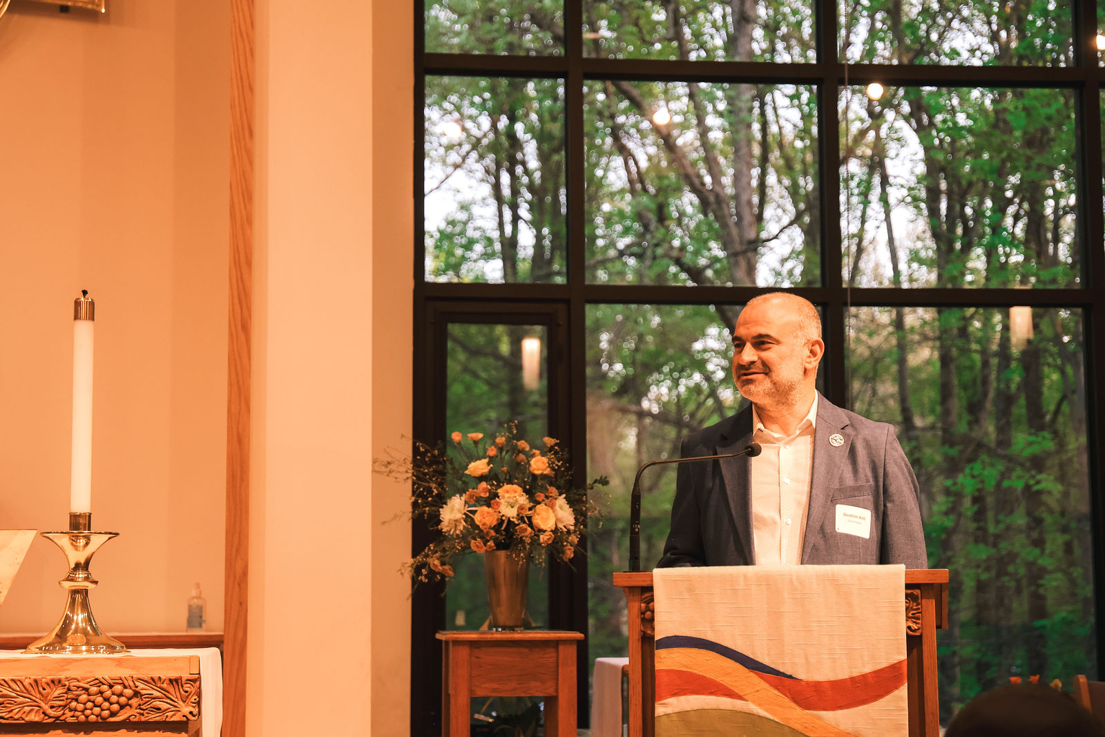 Ibrahim Anli speaks during a Faith250 gathering at St. Peter’s in the Woods