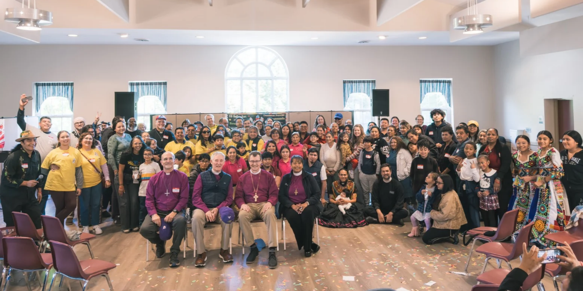 Participants and clergy gathered for the Many Cultures Festival group photo