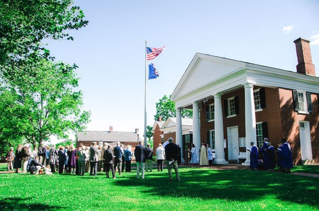 Members of Grace Episcopal Church gathered outside the Goochland County Courthouse for the 150th anniversary liturgy.
