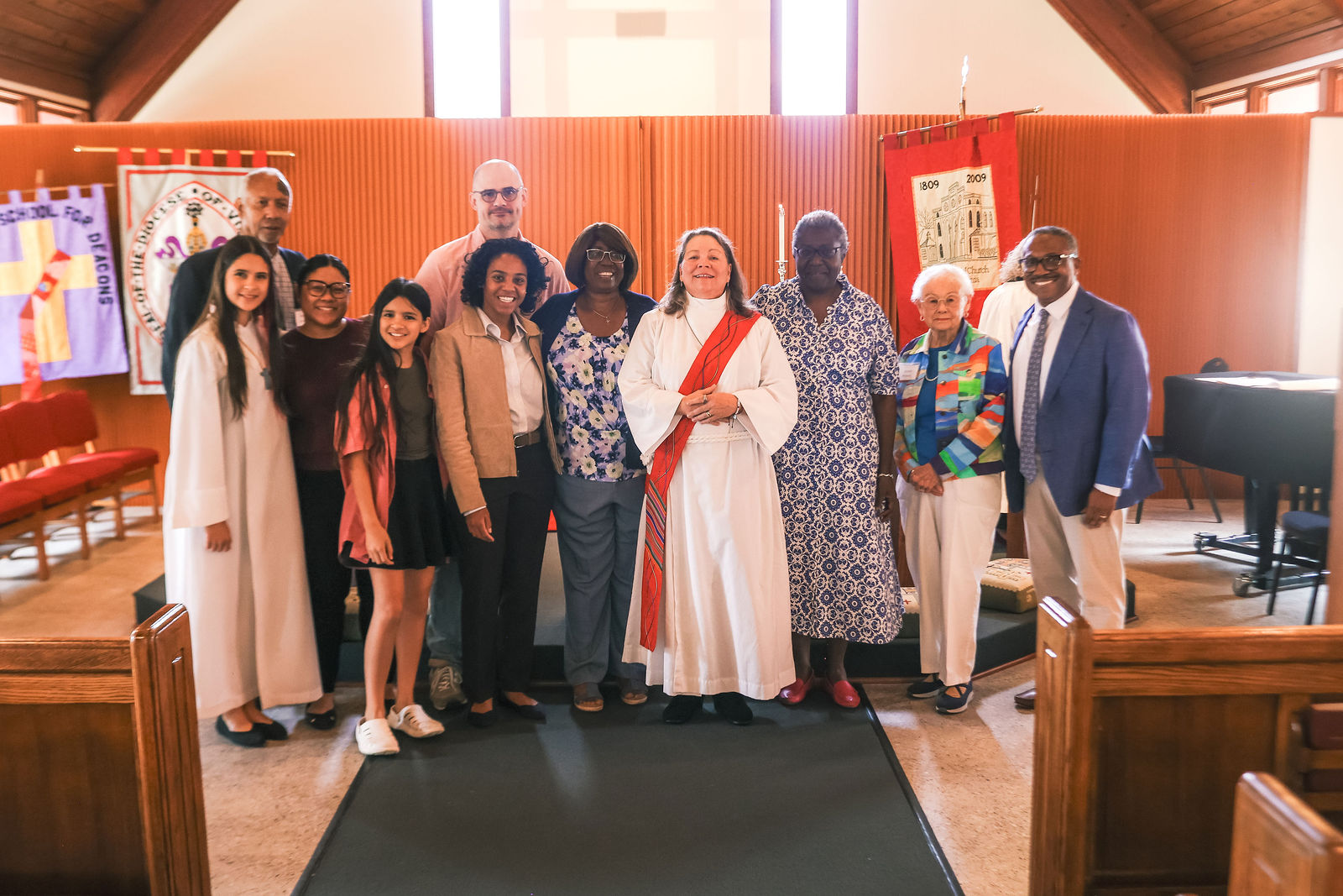 Congregants and clergy gather for Melissa Ann Carter's ordination to the diaconate.